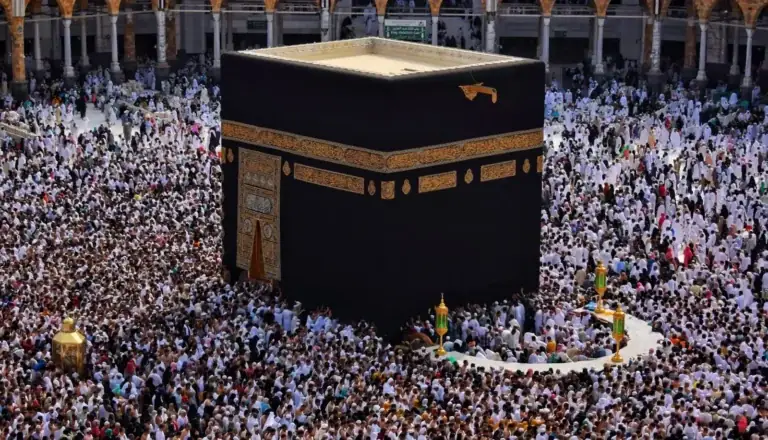 Pilgrims performing Tawaf around the Kaaba seen from above